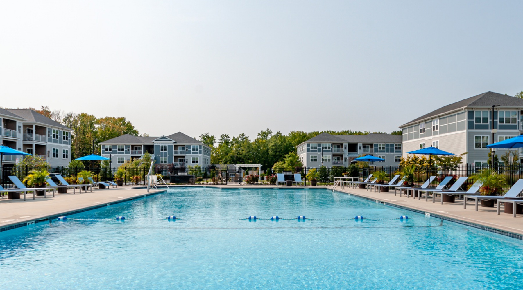 pool Resort-style swimming pool with lounge seating
